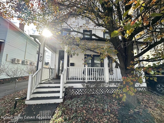 view of front of home featuring covered porch