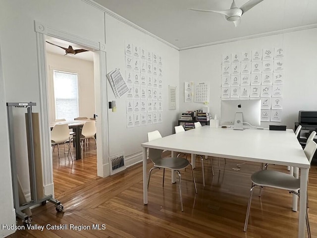 home office with ceiling fan and ornamental molding