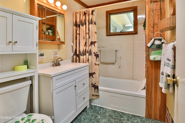 full bathroom with shower / bath combination with curtain, vanity, crown molding, tile walls, and toilet