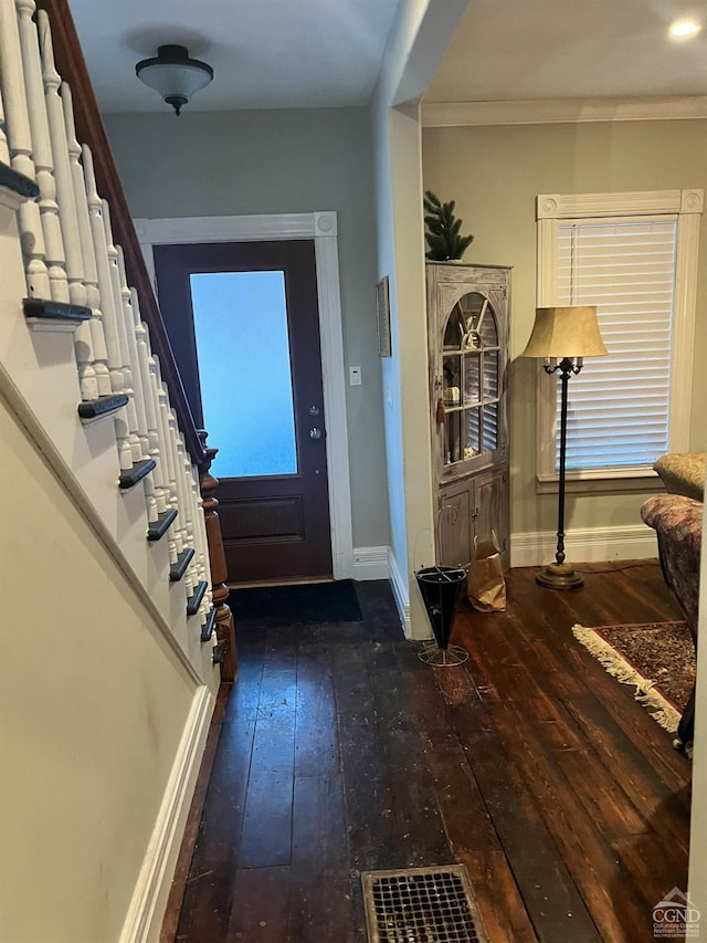 15 N Warren St, Athens, NY 12015 - foyer entrance featuring dark wood-style flooring, baseboards, stairs, and crown molding
