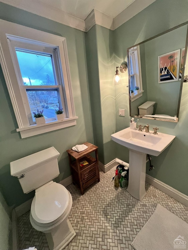 15 N Warren St, Athens, NY 12015 - half bath featuring toilet, baseboards, and crown molding