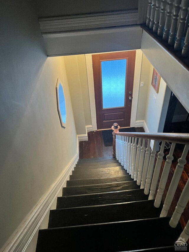 15 N Warren St, Athens, NY 12015 - staircase featuring wood finished floors and baseboards