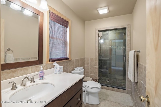 16 Wang Dr, Copake, NY 12516 - bathroom with tile walls, a stall shower, vanity, tile patterned flooring, and a wainscoted wall