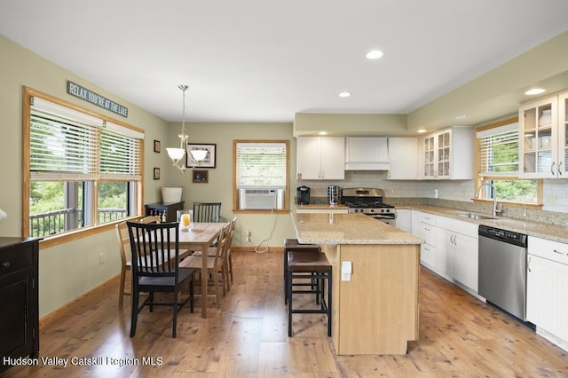 16 Wang Dr, Copake, NY 12516 - kitchen with stainless steel appliances, healthy amount of natural light, light wood-type flooring, a kitchen island, and recessed lighting