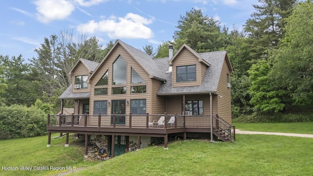 16 Wang Dr, Copake, NY 12516 - view of front facade featuring a front lawn, a wooden deck, and roof with shingles