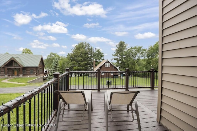 16 Wang Dr, Copake, NY 12516 - wooden deck with a lawn