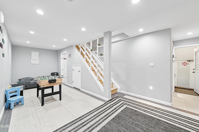 game room with recessed lighting and baseboards
