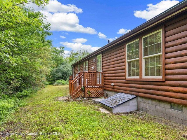 719 Allen Teator Rd, Durham, NY 12469 - view of side of home with a lawn