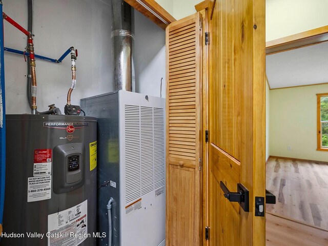 719 Allen Teator Rd, Durham, NY 12469 - utility room with electric water heater