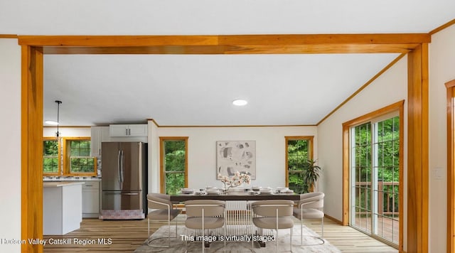 719 Allen Teator Rd, Durham, NY 12469 - dining area featuring light wood finished floors, ornamental molding, lofted ceiling, and recessed lighting