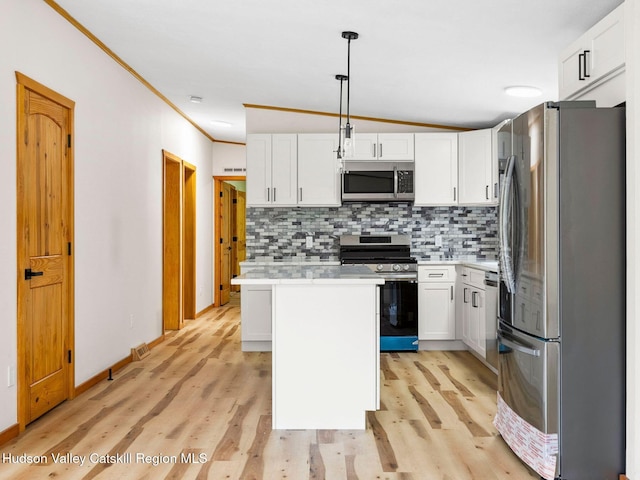 719 Allen Teator Rd, Durham, NY 12469 - kitchen with stainless steel appliances, backsplash, light countertops, a kitchen island, and white cabinets