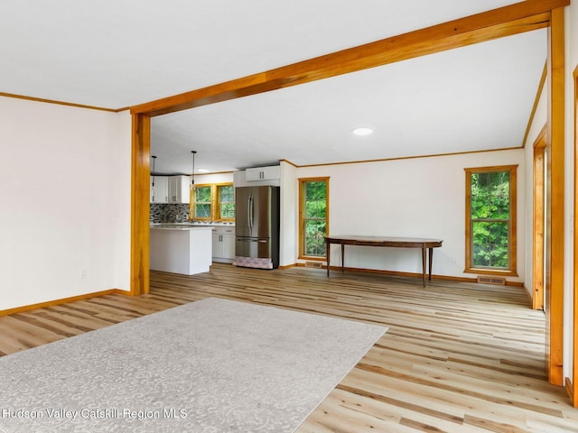 719 Allen Teator Rd, Durham, NY 12469 - unfurnished living room featuring ornamental molding, light wood-type flooring, and recessed lighting