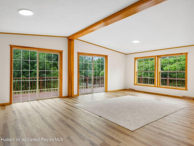 719 Allen Teator Rd, Durham, NY 12469 - unfurnished living room featuring wood finished floors and ornamental molding