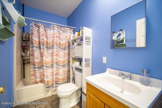 bathroom featuring shower / tub combo with curtain, vanity, and toilet