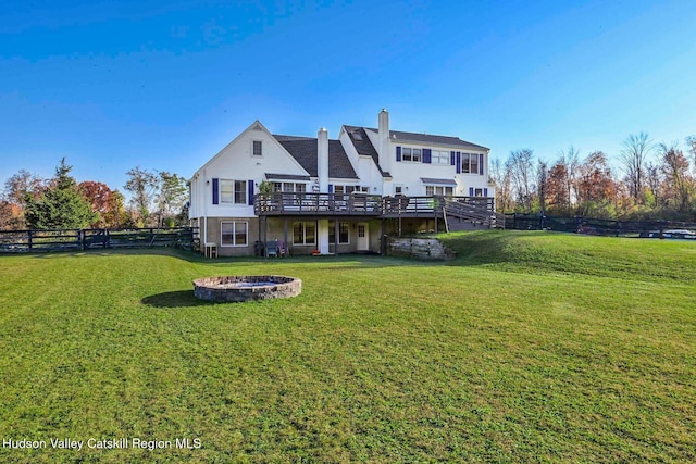 339-345 Jessup Rd, Florida, NY 10921 - rear view of house featuring a deck, a fire pit, a fenced backyard, a chimney, and stairs