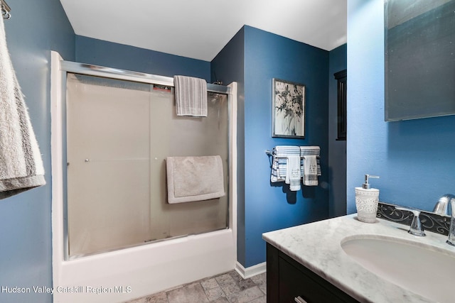 339-345 Jessup Rd, Florida, NY 10921 - bathroom with vanity, stone finish floors, and shower / bath combination with glass door