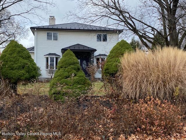 21 Lohmaier Ln, Lake Katrine, NY 12449 - rear view of property featuring a chimney and a metal roof