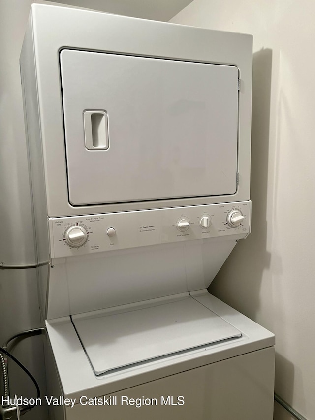 8 Trailside Dr Unit B-9, Hunter, NY 12442 - washroom with stacked washing machine and dryer