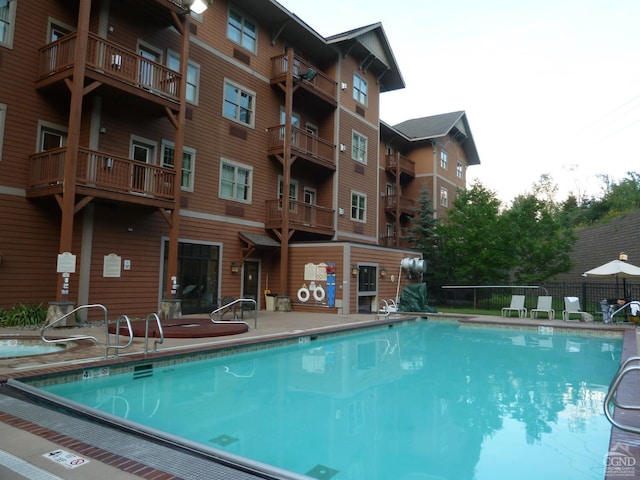 62-238E4 Liftside Dr, Hunter, NY 12442 - community pool featuring fence