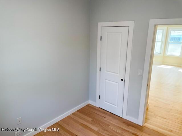 40 Fairview Ave, Hudson, NY 12534 - unfurnished bedroom with light wood-style floors and a closet