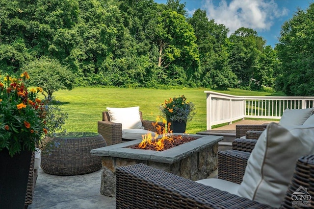  - view of patio with a fire pit, central air condition unit, and a wooden deck