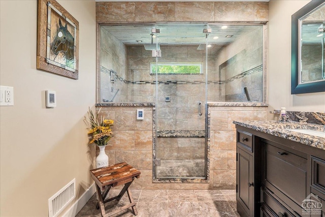  - bathroom with vanity and a stall shower