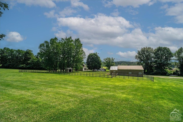  - view of yard featuring an outbuilding and a view of countryside