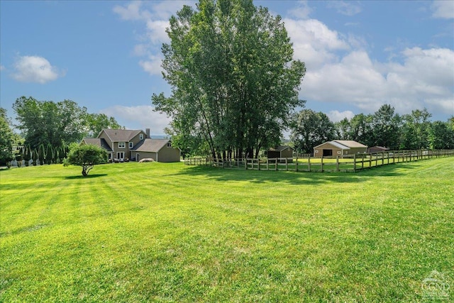  - view of yard featuring an outbuilding