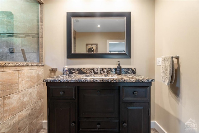 - full bathroom with vanity and a walk in shower
