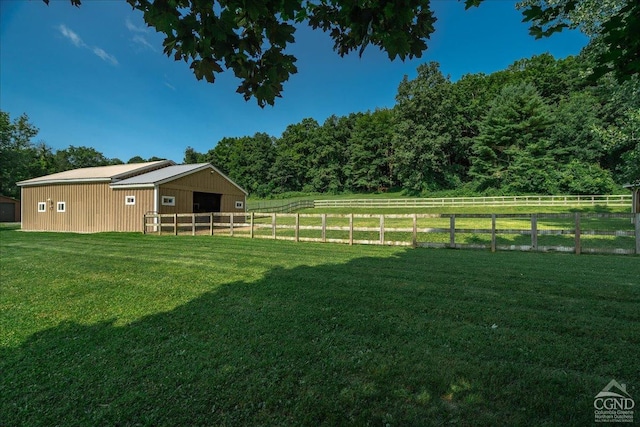  - view of yard with a pole building, an outbuilding, and an exterior structure