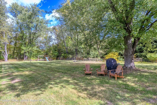 view of yard with a playground