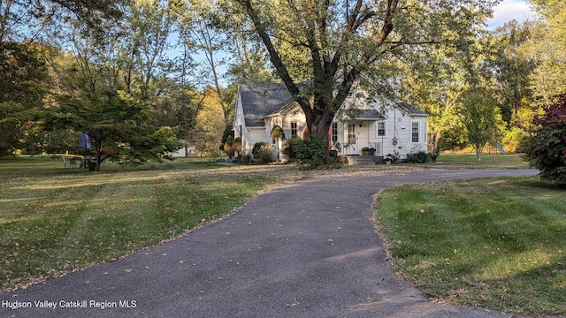 179 Grove St, Tillson, NY 12486 - view of front of house featuring driveway and a front lawn