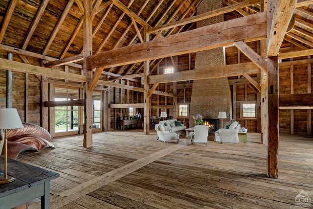 118 Finkle Rd, Ancram, NY 12503 - misc room featuring high vaulted ceiling, healthy amount of natural light, and a brick fireplace