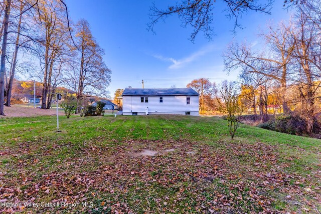 exterior space with a lawn