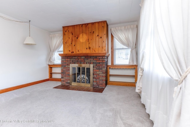 living room with light carpet and a brick fireplace