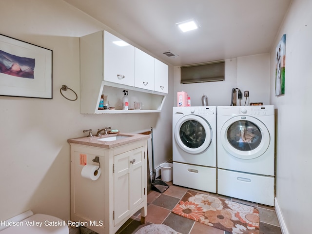 laundry room featuring washer and dryer and sink