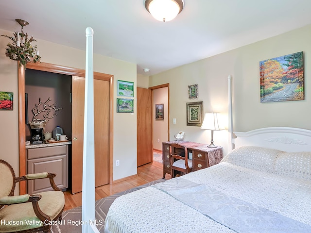 bedroom with light wood-type flooring