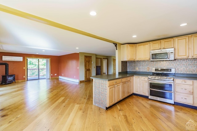 38 Cheviot Rd Unit 8, Germantown, NY 12526 - kitchen featuring appliances with stainless steel finishes, light brown cabinetry, open floor plan, a baseboard heating unit, and recessed lighting
