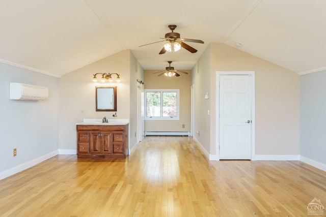 38 Cheviot Rd Unit 8, Germantown, NY 12526 - additional living space with baseboard heating, a ceiling fan, a wall unit AC, light wood-style flooring, and lofted ceiling