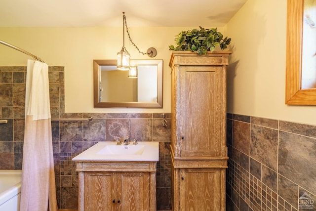 38 Cheviot Rd Unit 8, Germantown, NY 12526 - bathroom featuring tile walls, vanity, and shower / bath combo