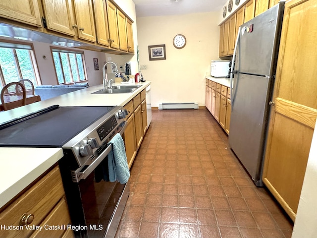 258 Watson Hollow Rd, West Shokan, NY 12494 - kitchen with stainless steel appliances, a baseboard radiator, a sink, light countertops, and brown cabinetry