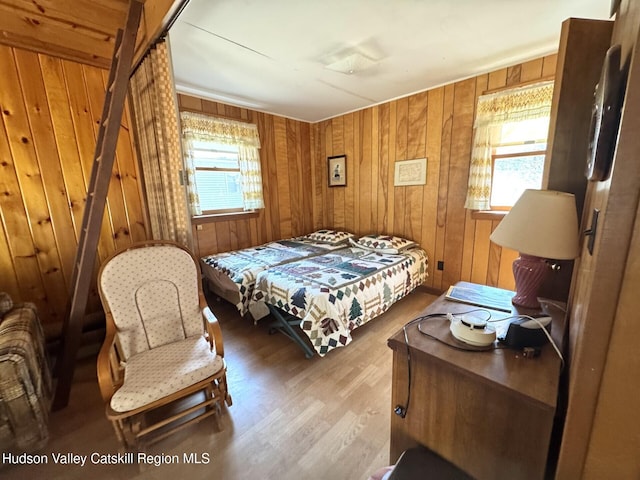258 Watson Hollow Rd, West Shokan, NY 12494 - bedroom featuring wood finished floors and wood walls