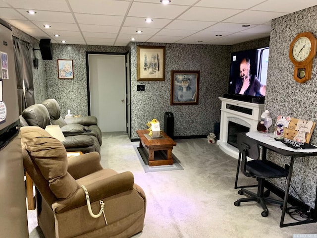 160 Willowbrook Rd, Hudson, NY 12534 - carpeted living area with a drop ceiling, wallpapered walls, and a fireplace with raised hearth