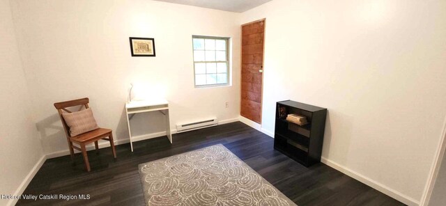 374 N Ridge Rd, Hannacroix, NY 12087 - unfurnished room with a baseboard radiator and dark wood-type flooring