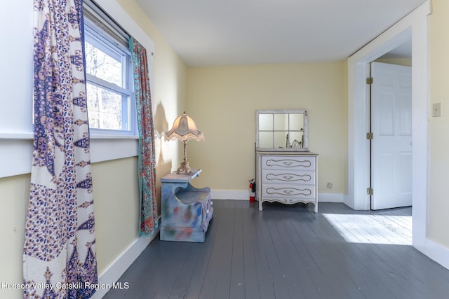 living area with dark wood-type flooring