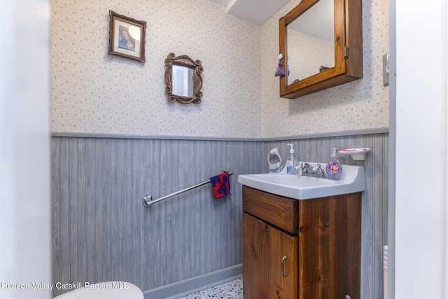 bathroom with vanity and toilet