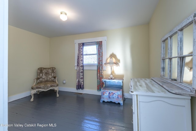 unfurnished room featuring dark wood-type flooring