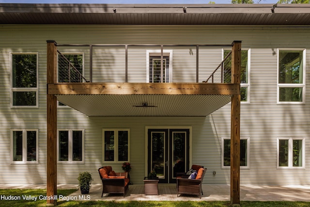 rear view of house featuring a patio