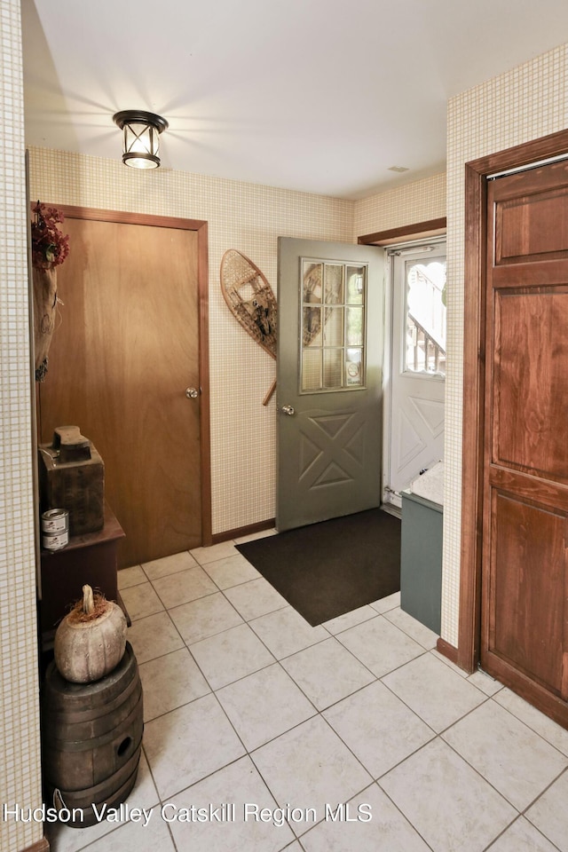 199 Echo Hill Rd, Saugerties, NY 12477 - interior space with wallpapered walls and light tile patterned flooring