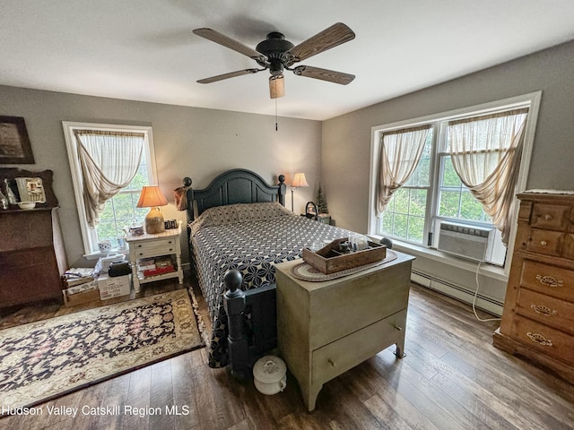 199 Echo Hill Rd, Saugerties, NY 12477 - bedroom with a ceiling fan, a baseboard heating unit, hardwood / wood-style flooring, and cooling unit